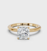 Yellow gold Cushion Cut Diamond Solitaire Ring with Six-Prong Setting and Classic Band