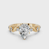 Yellow gold Pear Solitaire Twisted Band with Prong Setting