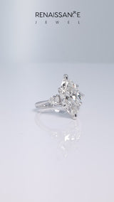 Silver Three-Stone Marquise Cut Diamond Ring with Pear Side Stones and Four-Prong Setting