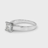 Silver Princess Solitaire Engagement Ring with Four-Prong Setting and Tapered Band