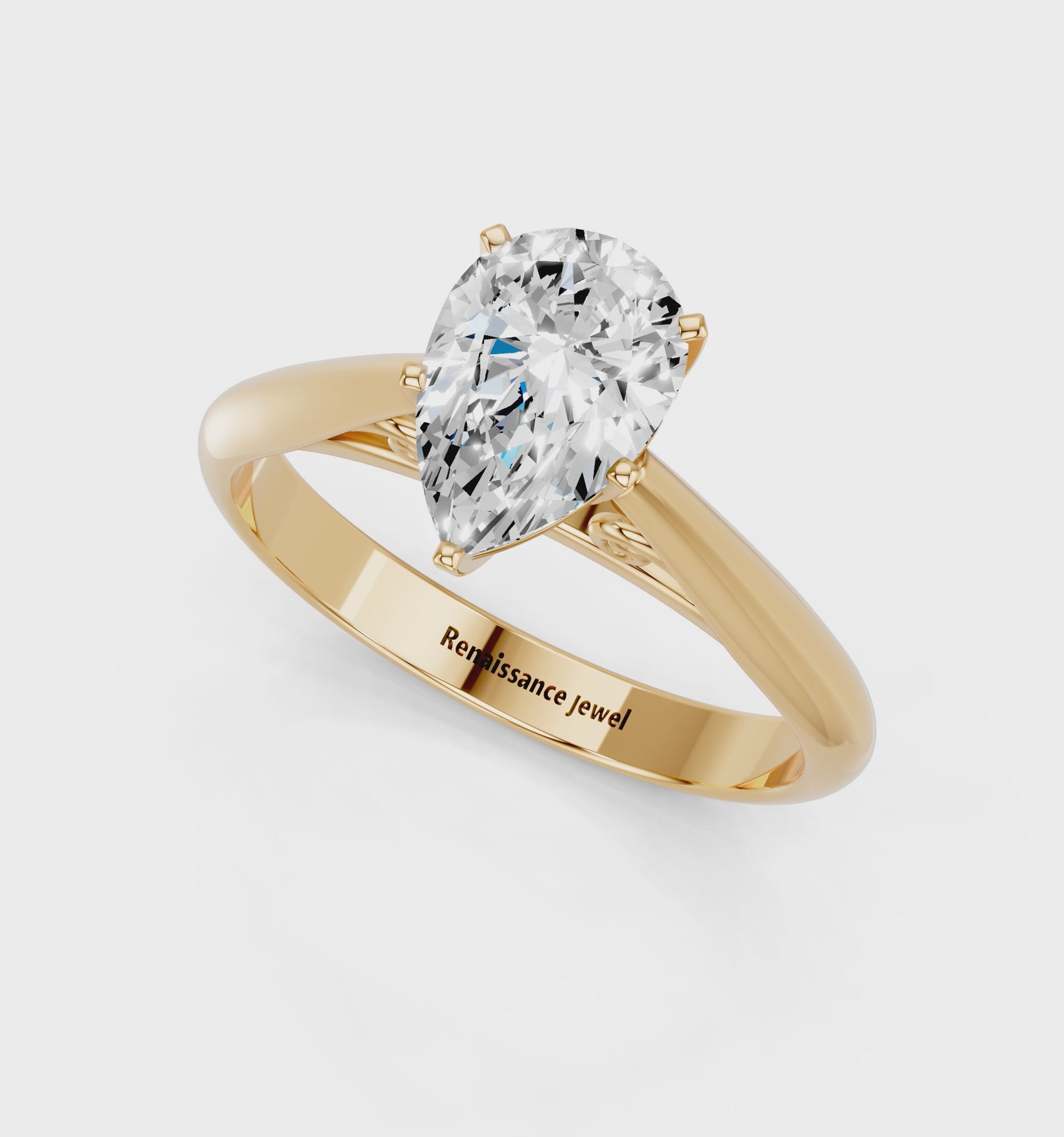 Yellow gold Pear Solitaire Diamond Engagement Ring with Cathedral Setting and Four-Prong Mount on a Classic Band_55