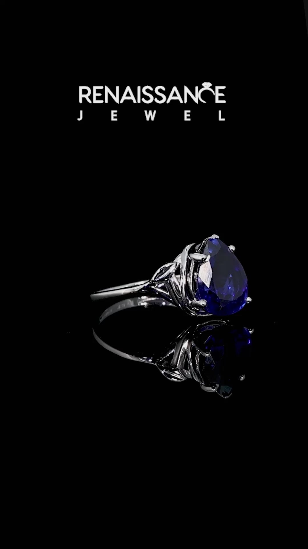White gold Pear Cut Blue Sapphire Solitaire Ring with Twist Band and Four-Prong Setting_14
