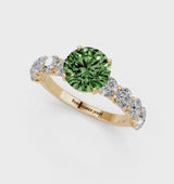 Yellow gold Fancy Green Round Cut Diamond Prong Setting with Side Stones on a Pave Band