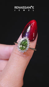 Yellow gold Prong-Set Pear-Cut Emerald with Diamond Halo and White Gold Band