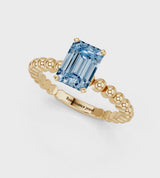 Yellow gold Fancy Blue Emerald Cut Diamond Solitaire Ring with Beaded Band and Prong Setting