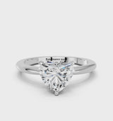 Platinum Heart Cut Diamond Solitaire Ring with Six-Prong Setting and Classic Band