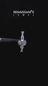 White gold Oval Cut Diamond Solitaire Engagement Ring with Twisted Pavé Band and Four-Prong Setting