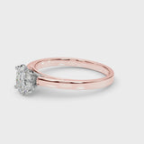 Rose gold Oval Solitaire Diamond Engagement Ring with Four-Prong Setting on a Classic Band