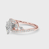 Rose gold Pear Solitaire with Pavé Twist Band and Four-Prong Setting
