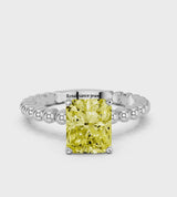 Platinum Fancy Yellow Radiant Cut Diamond Solitaire Ring with Beaded Band and Prong Setting