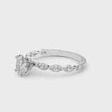White gold Oval Cut Diamond Ring with Marquise Side Stones and Prong Setting