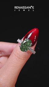 White gold Fancy Green Oval Cut Diamond Side Stone Solitaire Ring with Round  and Four-Prong Setting