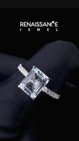 White gold Emerald Cut Aquamarine Solitaire Ring with Round  Pavé Band and Four-Prong Setting