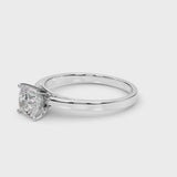 White gold Cushion Solitaire Diamond Engagement Ring with Four-Prong Setting on a Classic Band