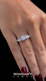 Platinum Three-Stone Cushion Cut Brilliant Diamond Solitaire Ring with Tapered Band and Four-Prong Setting