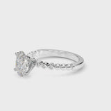 Platinum Oval Solitaire Bezel Accent Diamond Engagement Ring with Beaded Band and Four-Prong Setting