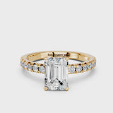 Yellow gold Emerald Solitaire Pave Diamond Engagement Ring with Four-Prong Setting