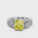 Platinum Fancy Yellow Radiant Cut Diamond Solitaire Ring with Milgrain Pavé Band and Four-Prong Setting