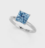 Platinum Fancy Blue Princess Cut Diamond Solitaire Ring with Six-Prong Setting and Classic Band
