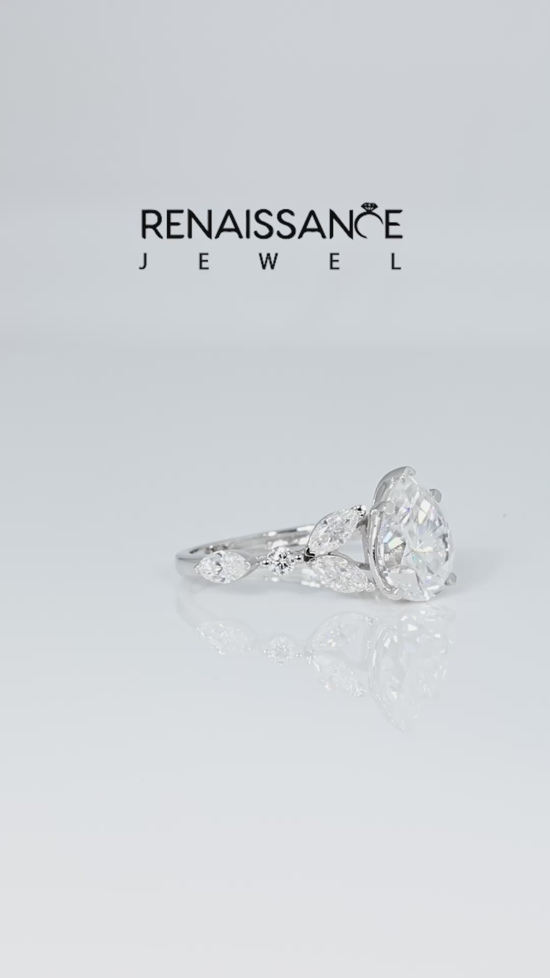 Silver Pear Cut Moissanite Solitaire Ring with Side Stones and Four-Prong Setting_13
