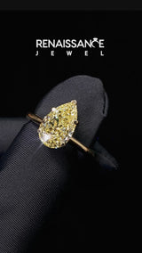 Yellow gold Fancy Yellow Pear Cut Diamond Solitaire Engagement Ring with Classic Band and Four-Prong Setting