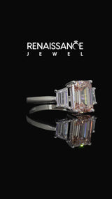 Platinum Fancy Pink Emerald  Diamond Three-Stone Ring with Trapezoid Side Stones and Prong Setting