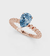Rose gold Fancy Blue Pear Cut Diamond Solitaire Ring with Beaded Band and Prong Setting