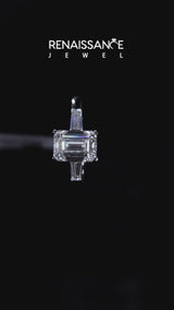 Platinum Emerald Cut Diamond Solitaire Ring with Tapered Baguette Accents and Four-Prong Setting