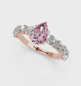 Rose gold Fancy Pink Pear Cut Diamond Prong Setting with Side Stones on a Pave Band