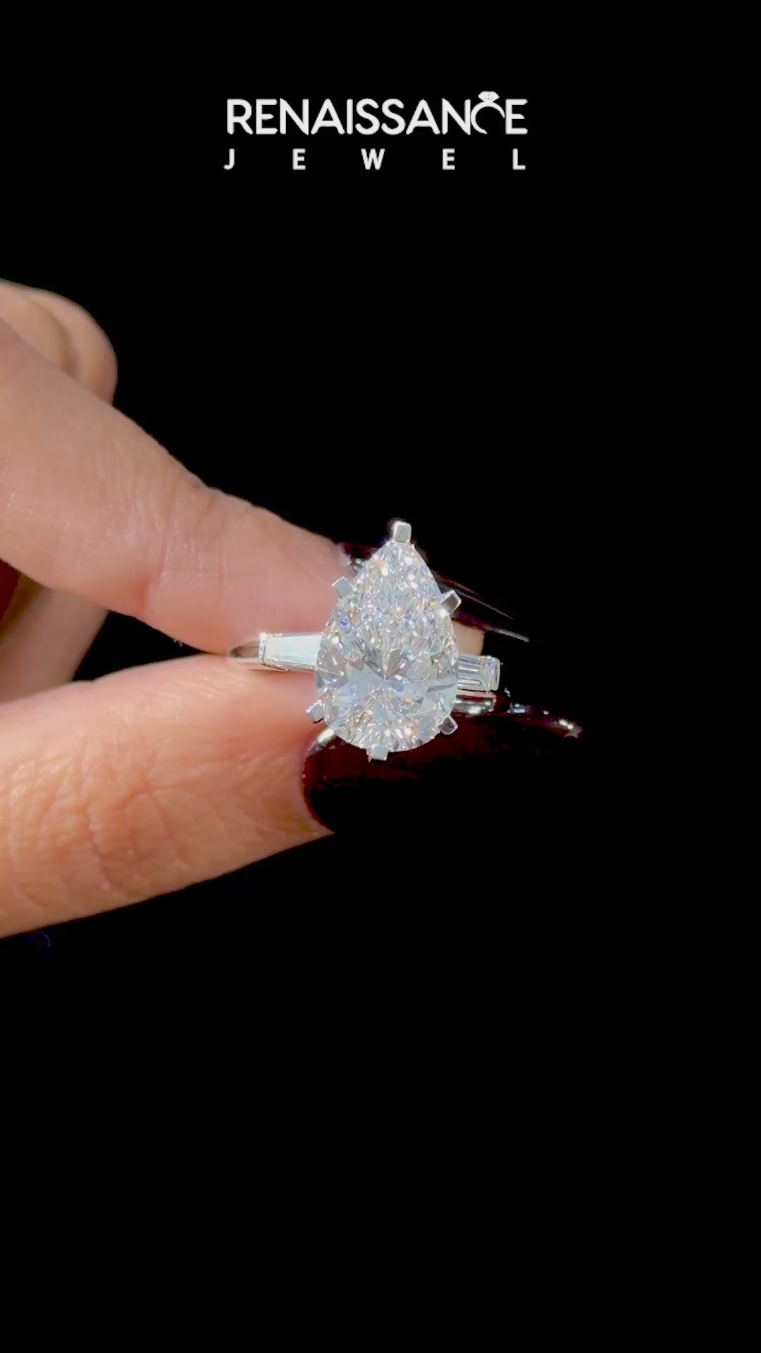 White gold Pear Solitaire with Tapered Baguette Side Stones on a Classic Band with Six-Prong Setting_24