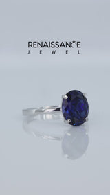 Silver Oval Cut Blue Sapphire Solitaire Engagement Ring with Classic Band and Four-Prong Setting