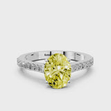 Silver Fancy Yellow Oval  Cut Solitaire Diamond Engagement Ring with Pave Band and Four-Prong Setting