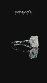 Silver Radiant Cut Diamond Ring with Marquise and Round with Blue Sapphire side stone Side Stones and Four-Prong Setting