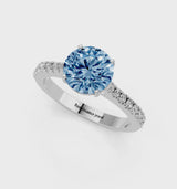 Silver Fancy Blue Round  Cut Solitaire Diamond Engagement Ring with Pave Band and Four-Prong Setting