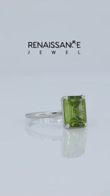 Silver Emerald Cut Peridot Solitaire Engagement Ring with Round Band and Four-Prong Setting