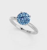 Silver Fancy Blue Round Cut Diamond Solitaire Ring with Six-Prong Setting and Classic Band