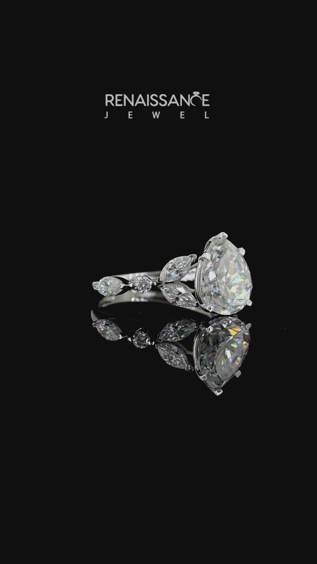 Silver Pear Cut Moissanite Solitaire Ring with Side Stones and Four-Prong Setting_18
