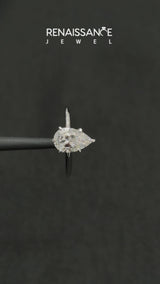 White gold Pear Cut Diamond Solitaire Engagement Ring with Round Band and Four-Prong Setting