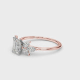 Rose gold Radiant Diamond Floral Cluster Ring with Marquise Side Stones and Six-Prong Solitaire Setting
