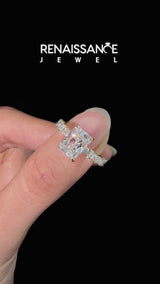 Yellow gold Radiant Cut Diamond Side Stone Solitaire Ring with Round and Four-Prong Setting