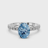 Platinum Fancy Blue Oval Cut Diamond Solitaire Pavé Band with Four-Prong Setting