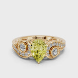 Yellow gold Fancy Yellow Pear Cut Diamond Solitaire Ring with Milgrain Pavé Band and Four-Prong Setting