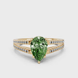 Yellow gold Fancy Green Pear Cut Diamond Solitaire Engagement Ring with Split Shank Pavé Band