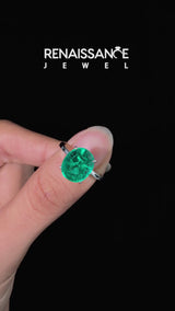 Silver Oval Cut Emerald Solitaire Engagement Ring with Classic Band and Four-Prong Setting