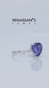 Silver Heart Cut Tanzanite Solitaire Ring with Flower Prong Setting and Classic Band