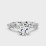 Silver Round Cut Solitaire Diamond Ring with Pave Band and Four-Prong Setting