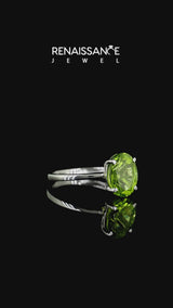 Silver Oval Cut Peridot Solitaire Engagement Ring with Classic Band and Four-Prong Setting