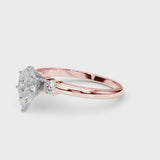 Rose gold Three-Stone Pear Cut Diamond Solitaire with Prong Setting and Classic Band