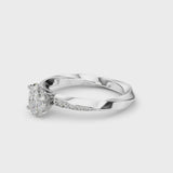 Platinum Oval Cut Diamond Engagement Ring with Side Stone Accents and Four-Prong Setting