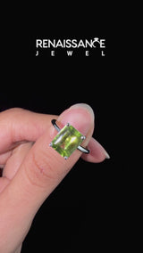 Silver Emerald Cut Peridot Solitaire Engagement Ring with Round Band and Four-Prong Setting